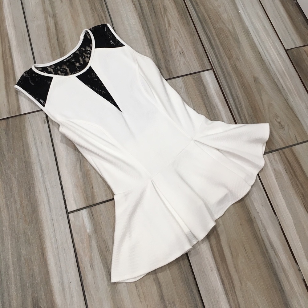 Allen. B. By Allen Schwartz. Peplum top